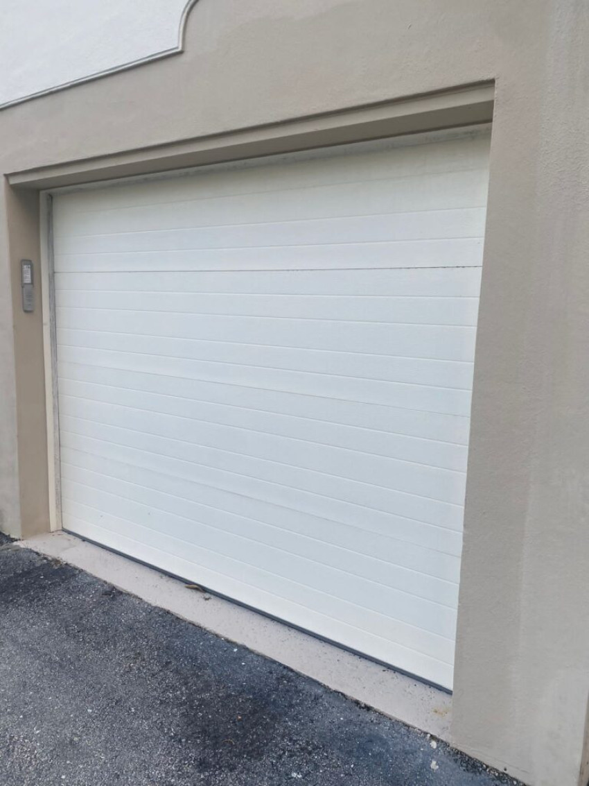 Replacing vs Repairing a Garage Door: Which is the Better Option?